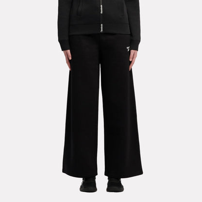 بنطال فليس للنساء بشعار صغير وقصّة واسعة