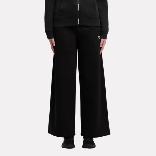 بنطال فليس للنساء بشعار صغير وقصّة واسعة